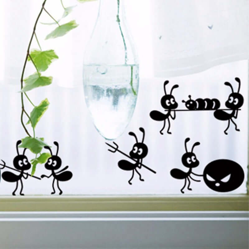 Cartoon ant wall stickers depicting ants moving home on a glass window in a children&