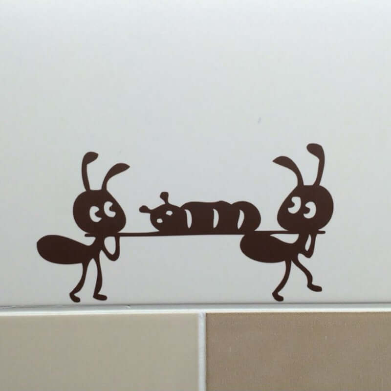 cartoon ant wall stickers featuring two cute ants carrying a caterpillar, perfect for children&