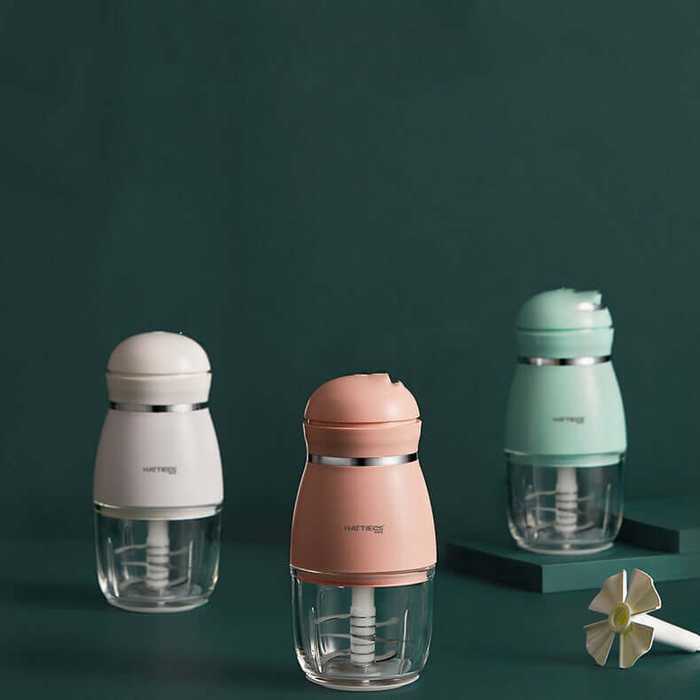 Home Kitchen Baby Supplement Cooking Machine; baby food cooking machine in white, pink, and mint colors.