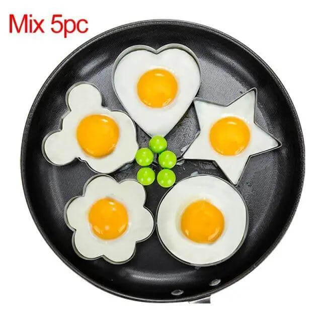 5Pcs Stainless Steel Fried Egg Mold Pancake Mould Omelette Mold Ring Cooking Fried Egg Bento Shaper Kitchen Gadget Frying Egg Cooking Tools Kitchen Accessories Gadget Rings - Egg shapes in frying pan.