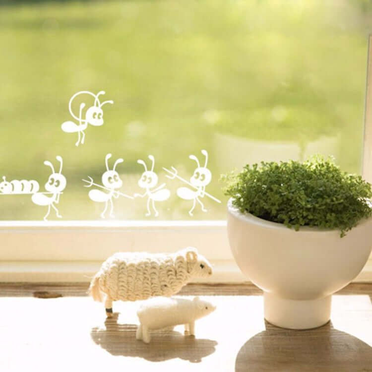 Cartoon ant wall stickers on a glass window, showcasing small animated ants for children&