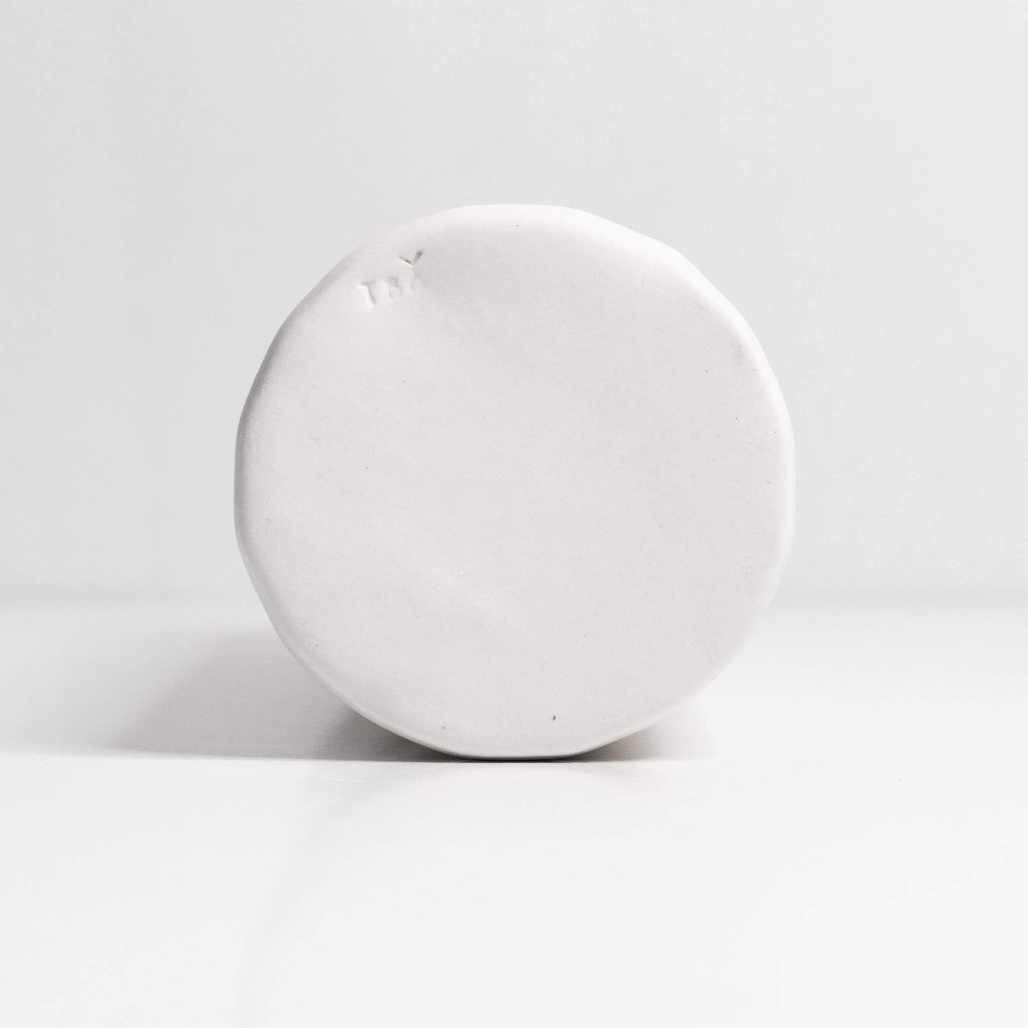 Elixir Porcelain Olive Oil Dispenser base view showcasing its smooth, high-quality ceramic finish.
