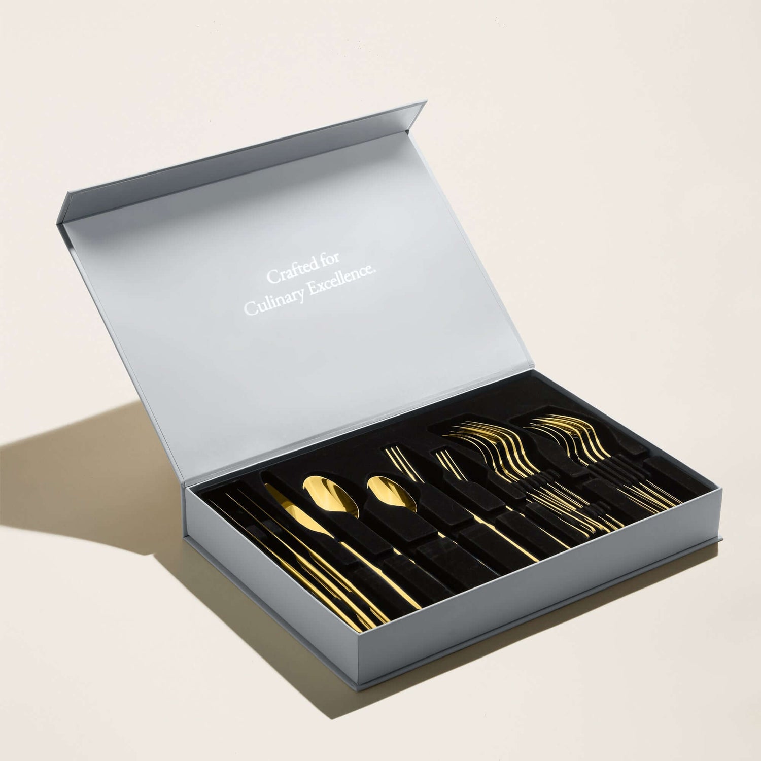 Emilia Mirror 20-Piece Flatware Set elegantly displayed in a stylish box, highlighting culinary excellence.